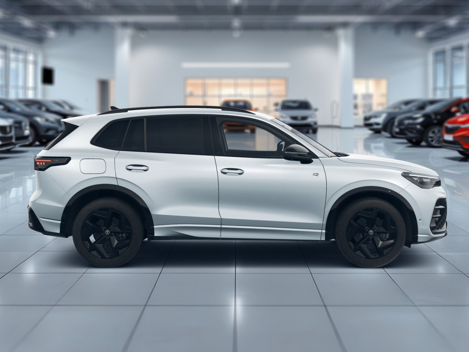 Fahrzeugabbildung Volkswagen Tiguan R-Line 1,5 eHybrid OPF (177 PS) / (115 PS) DSG*AHK*WINTERRÄDER*NAVI*