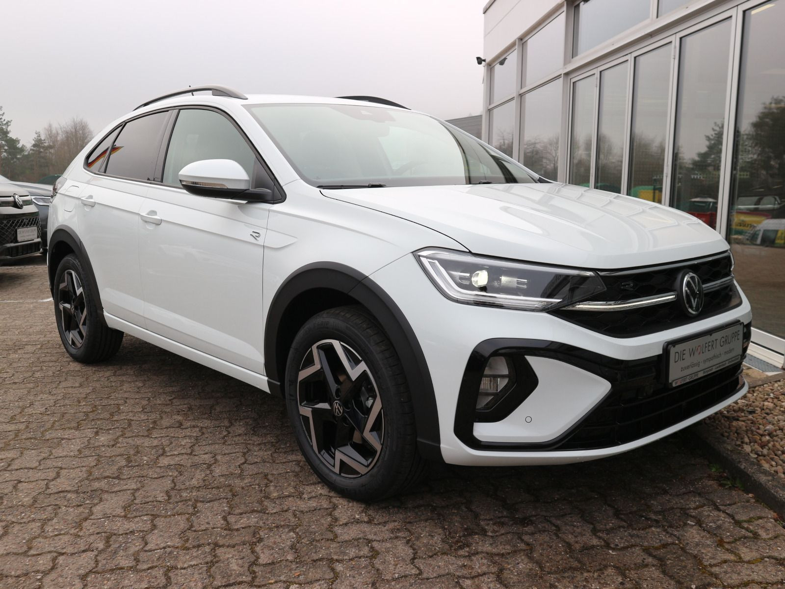 Fahrzeugabbildung Volkswagen Taigo R-Line 1,5 TSI OPF (150 PS) DSG *WINTERRÄDER*KAMERA*NAVI*