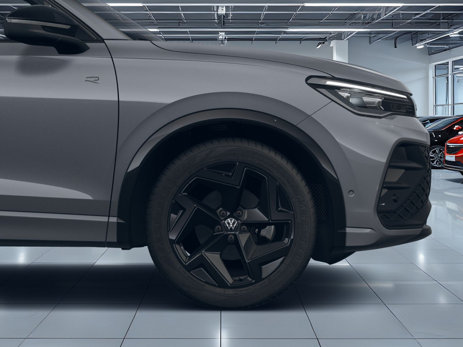 Fahrzeugabbildung Volkswagen Tiguan R-Line 1,5 eTSI OPF 110 kW (150 PS) DSG *AHK*WINTERRÄDER*NAVI*BLACKSTYLE*