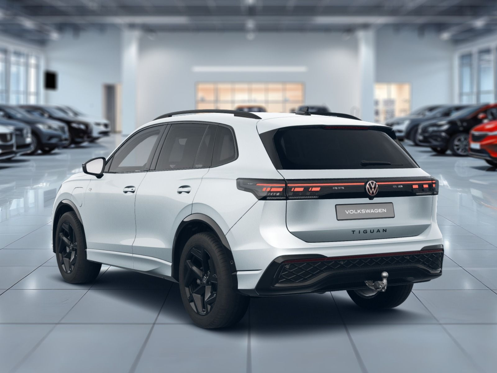 Fahrzeugabbildung Volkswagen Tiguan R-Line 1,5 eHybrid OPF (177 PS) / (115 PS) DSG*AHK*WINTERRÄDER*NAVI*